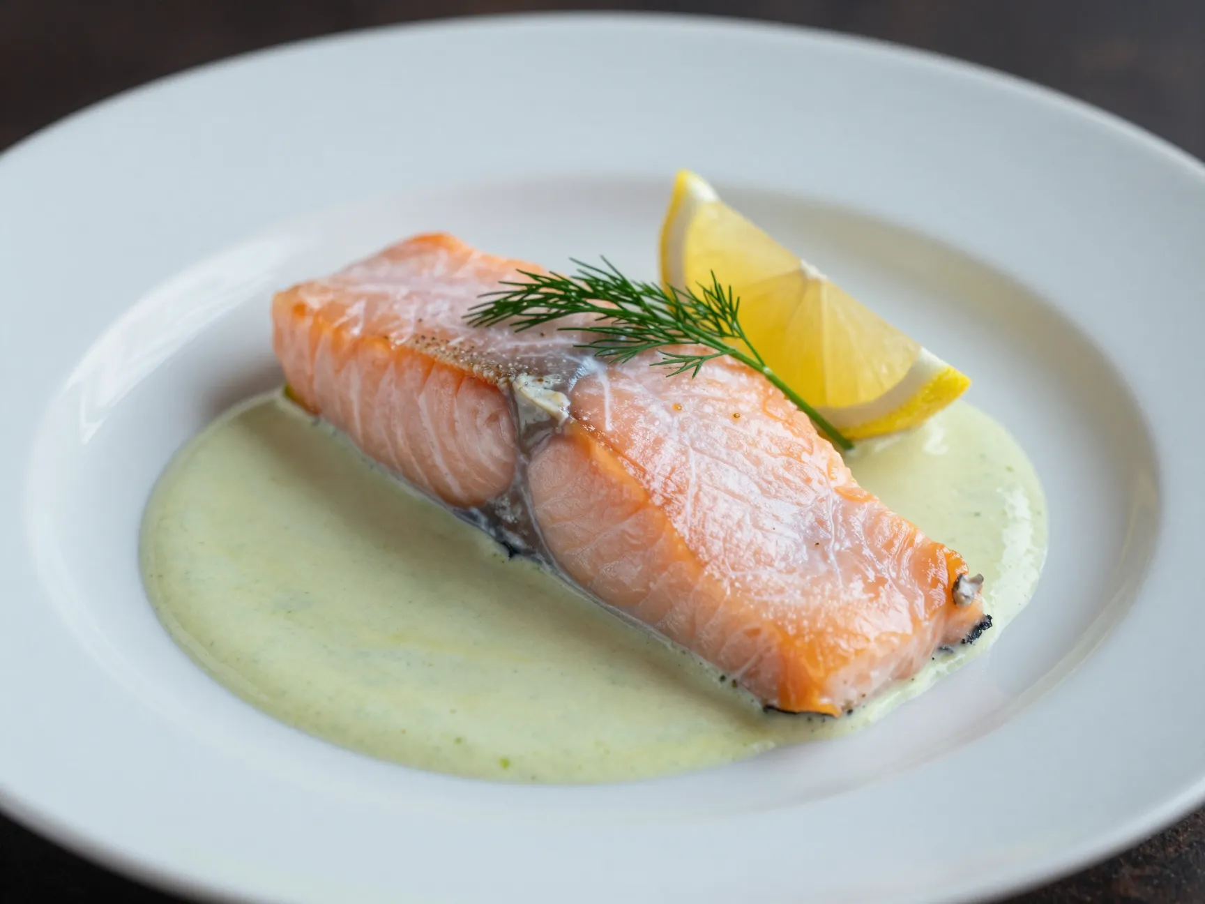 Poached salmon with dill cream sauce