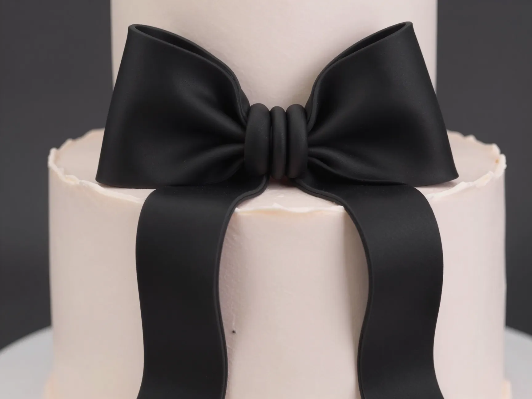 The black ribbon coquette cake